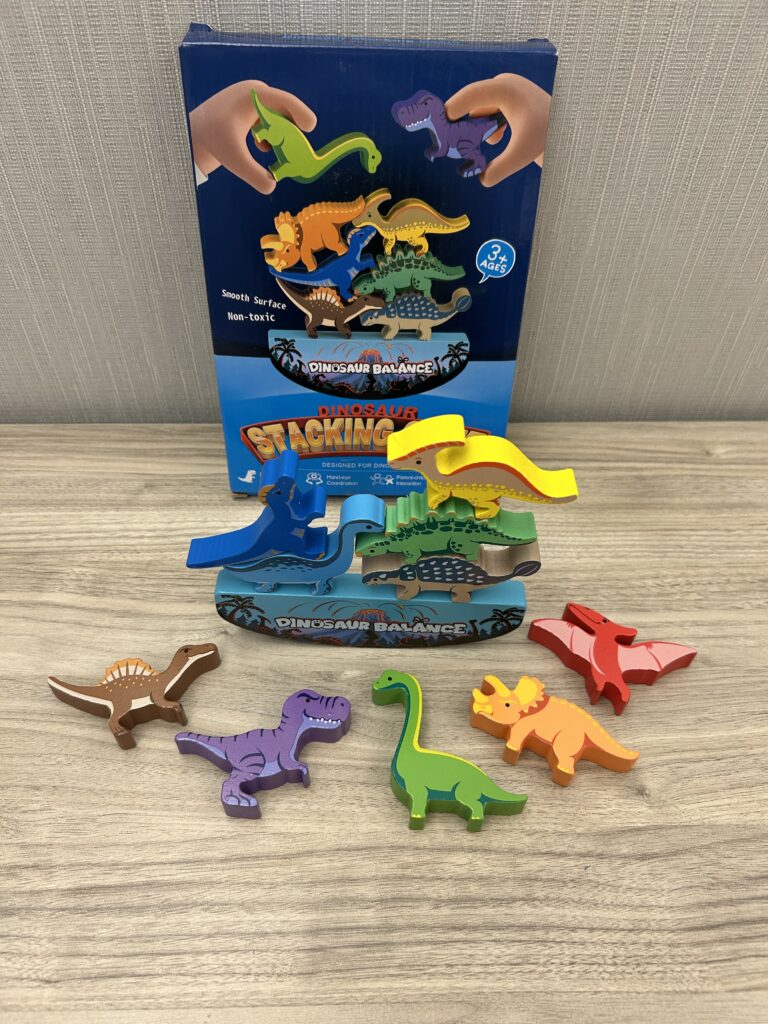 Dinosaur stacking game box and components